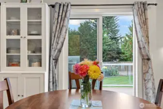 Dining Area looking out slider to back deck and yard.