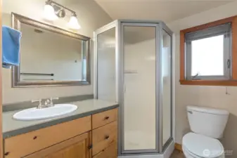 View of upper level bedroom/bunk room bathroom.