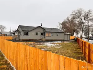 Huge fenced front yard.