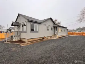 Great gravel driveway with easy access to kitchen.