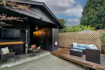 This photo shows both backyard living areas, such a luxury to find in the city.