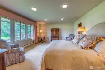 The primary suite has ample room for a seating area.