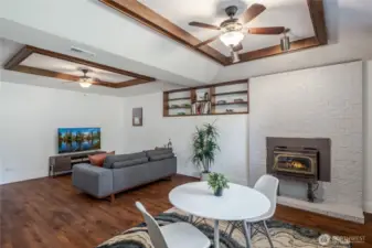 Basement bonus room with wood coffered ceiling & skylights