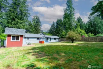 Separate storage shed off the attached storage area in garage.