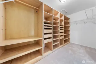 A truly expansive walk-in closet with custom shelving and ample storage—designed to keep everything beautifully organized.