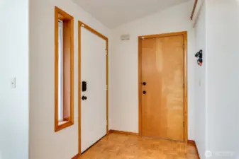 Light and bright entry with vaulted ceiling and coat closet sets the tone for the open interior layout.