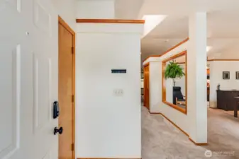 Step inside to a flowing, open floorplan with large windows, vaulted ceilings & skylights that give the home tons of natural light.