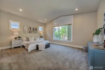 Primary Bedroom with vaulted ceilings