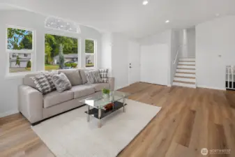 Open concept living room with fireplace