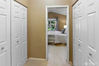 Double closets with built in shelving/drawers in primary bedroom