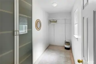 Walk in closet for bedroom 2 of 3. Cabinet on left conveys