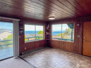 Entry is on the right, dining area