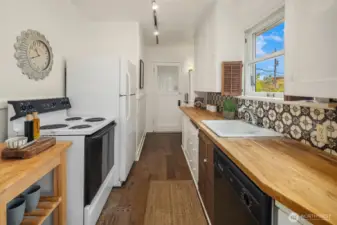 Kitchen looking toward back door to deck.