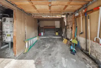 Garage with workbench in back.