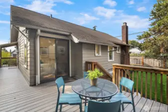 Deck with access from the kitchen and primary bedroom.