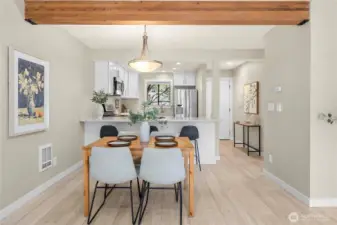 Exposed wood beam in ceiling offers a rustic and inviting feeling.