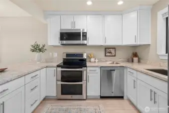 Abundant cabinet space throughout.