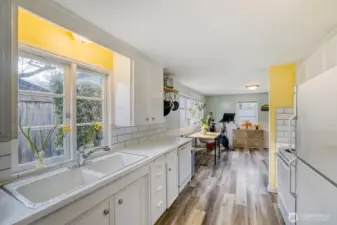 Big window in kitchen bringing in more light.