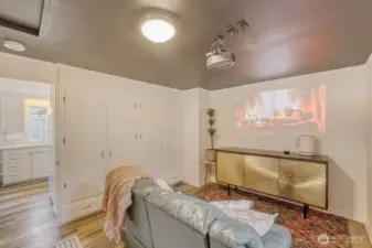 Right off the kitchen for grabbing more popcorn!