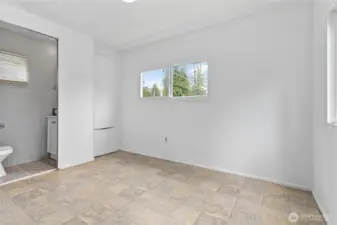 Primary bedroom with attached bathroom.