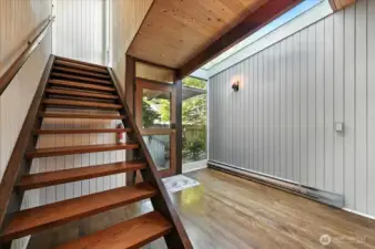 Skylight in entry brings natural light inside.
