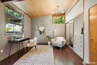 Flexible space was staged as an office. Staging has been removed.