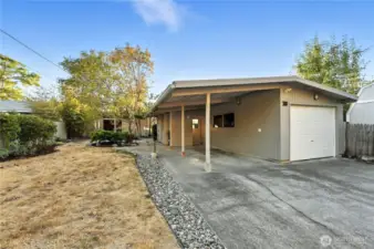 1 car garage with carport.