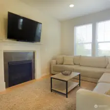 Living room with cozy gas fireplace.