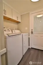 Laundry off of back door.