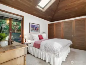 The 2nd of 3 bedrooms, is private and quietly set apart from the Primary suite.