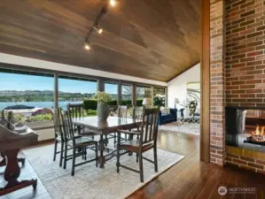 The open flow of the living and dining rooms is gracious and inviting for entertaining from comfortable cocktail gatherings to holiday settings.