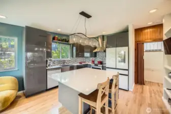 Gleaming lacquer cabinetry and new appliances