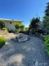 Landscaped with pond and separate water feature