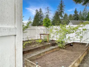 vinyl fencing, secluded garden area.