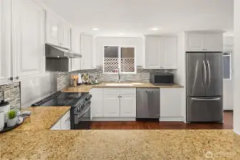 Entertaining is easy in well designed Kitchen that also features extra eating space, not shown in this photo.