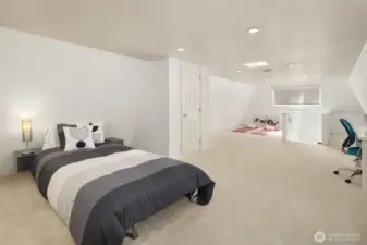 Third floor loft is a perfect 3rd Bedroom, Office and Workout area.