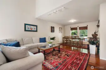 Living room looking toward dining room and backyard beyond.