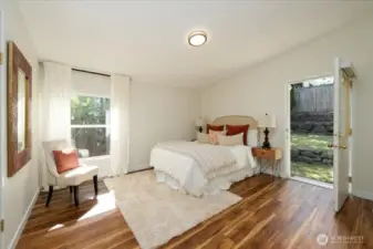 Primary suite opens directly to the backyard