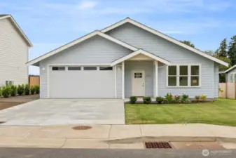 This brand new home has amazing curb appeal and is situated in such a lovely development along the shores of Drayton Harbor.