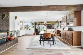 Large dining room, built in shelves, and direct access to sun room