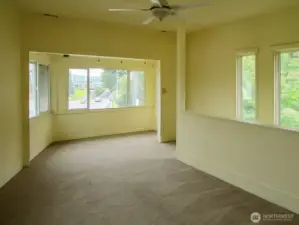 Unit A Livingroom with tons of natural light.