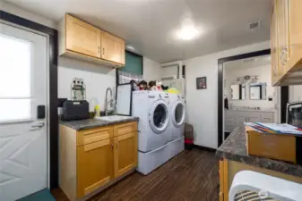 laundry room and on-demand hot water system all new in 2020