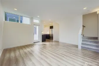 Large open living space with convenient kitchen access