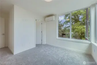 Primary bedroom with mini-split unit