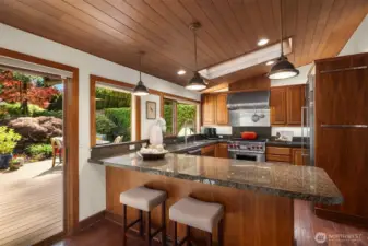 The heart of the home is the sun-drenched kitchen and family room, opening to a newly finished garden courtyard. Picture yourself sipping a morning latte or enjoying afternoon tea in this peaceful outdoor haven.