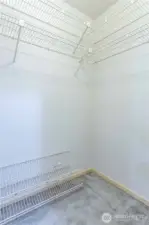 Walk-in closet space in primary bedroom