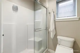 Separate shower room in primary bath.