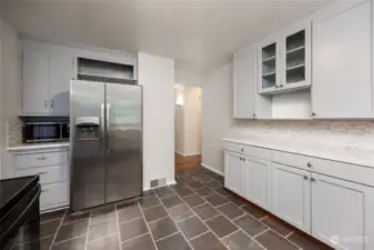 Updated kitchen with added cabinets and counter space.