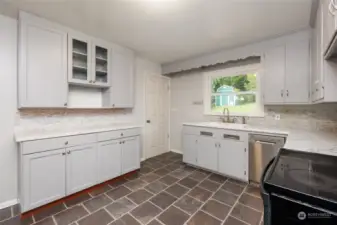 Updated kitchen with added cabinets and counter space.