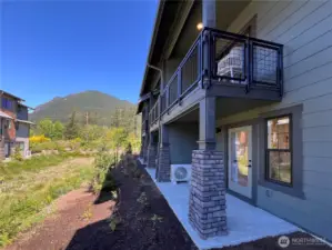 1502 Covered patio and covered deck with serene views.